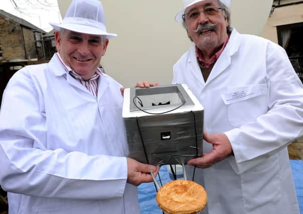 Organiser Tony Callaghan and pie maker Bill Kenyon ready with the space-bound pie
