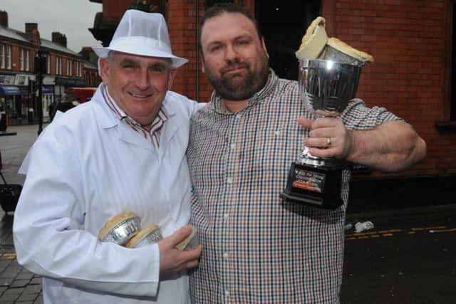 Event organiser Tony Callaghan, left, with Martin Appleton-Clare, the winner of the World Pie Eating Championship 2015