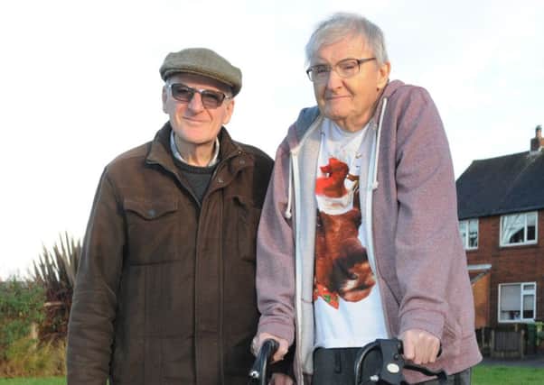 John Melling, 74,  right, (also known as Jack) with brother George, 72, going for a walk to the local shops - John was helped by the Taylor Unit a neuro-rehab unit at Leigh Hospital, with their support he now has mobility and can live independently.  They are upset about the proposed closure of the unit