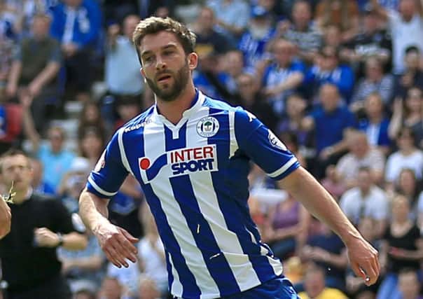 Will Grigg has found chances harder to come by this season