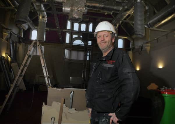 Derek Eccleston working on the theatre at The Old Courts