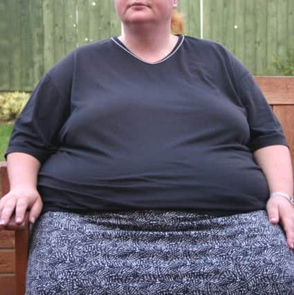 Lisa Brabrook when she weighed 25 stones. She has since lost 14 stones.