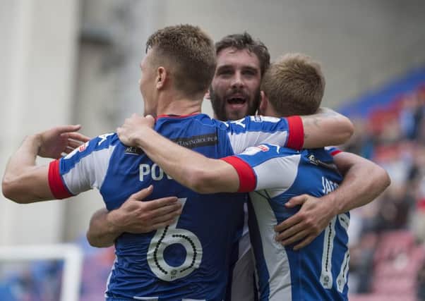 Will Grigg, with Max Power