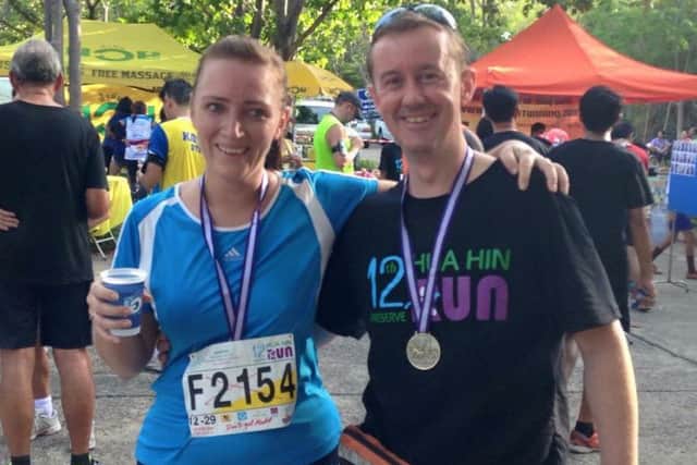 Warren Shaw with friend and running partner Annie Smith at the end of Hua Hin Run 2015