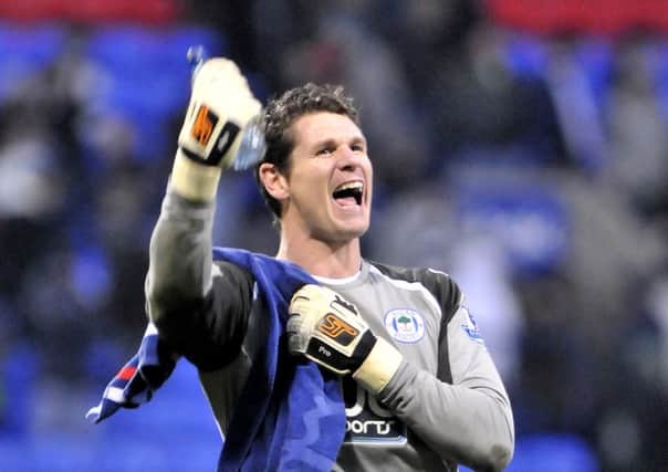 Mike Pollitt spent more than a decade with Wigan Athletic