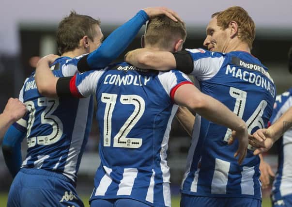Callum Connolly marks his Latics debut in style