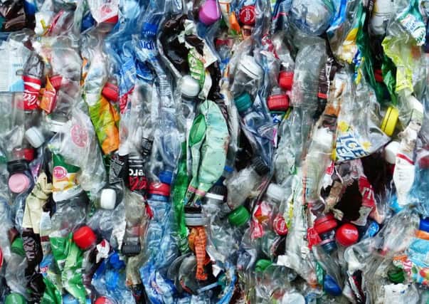 Greenpeace is proposing a bottle deposit return scheme in a bid to end plastic bottles polluting the sea