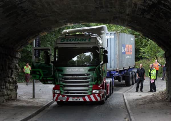 An Eddie Stobart lorry crashed into Gathurst Bridge casuing delays to trains using the Southport line