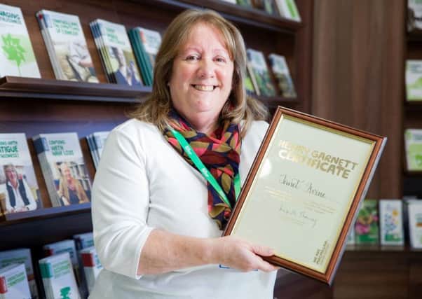 Janet Irvine with her Macmillan Award