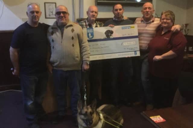 Balmoral Hotel's charity event for Andrew Parkinson. 
From left to right: 
David Fowler, Alan Jones with pooch Oliver , Andy Lee, Trevor Parkinson ,Stuart Tollitt and Helen Fowler