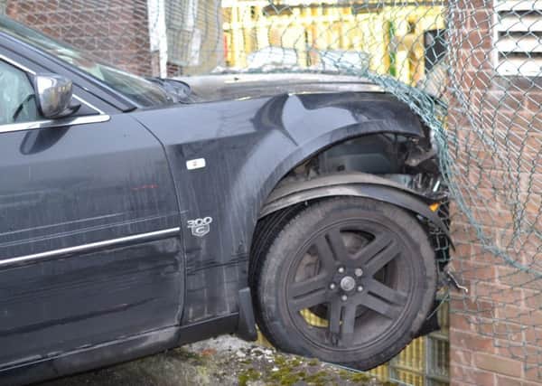 Damage to the wall of the BT telephone exchange in Cross Street, Hindley, after an out-of-control Chrysler car ploughed into it