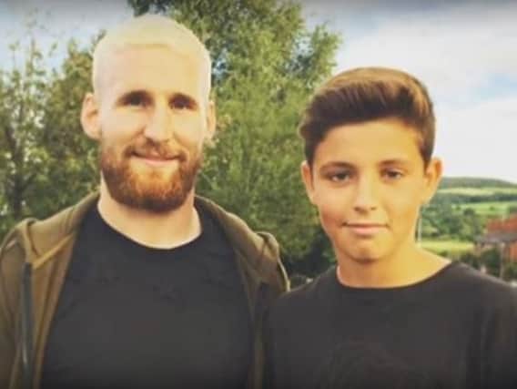Warriors star Sam Tomkins pictures with Louis Simpson in a video tribute