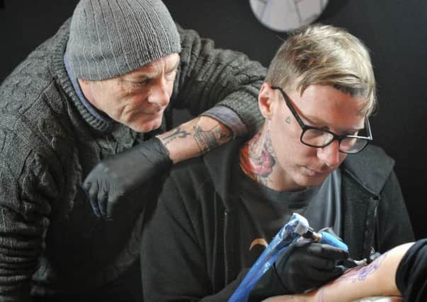 Mike and Chris Burwin of Alchemy Tattoo Studio
