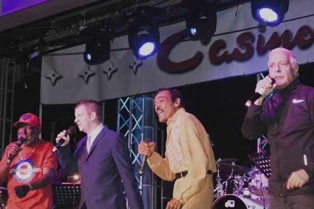 Sidney Barnes, Paul Stuart Davies, Tommy Hunt and Dean Parrish singing at a Northern Soul event