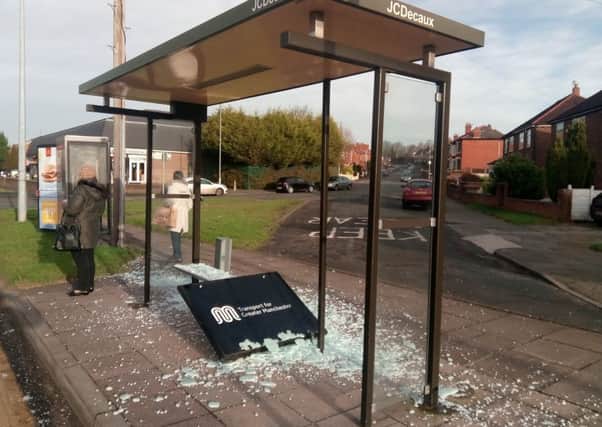 The bus shelter on Woodhouse Lane after it was wrecked by vandals again