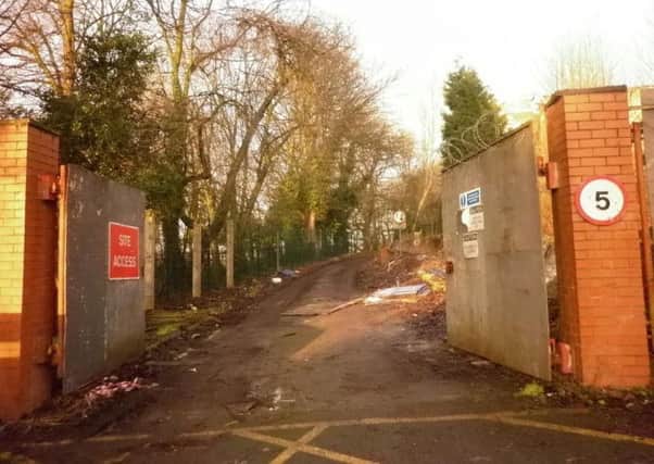 Gates left open at the Pagefield building in Wigan after the lock was vandalised