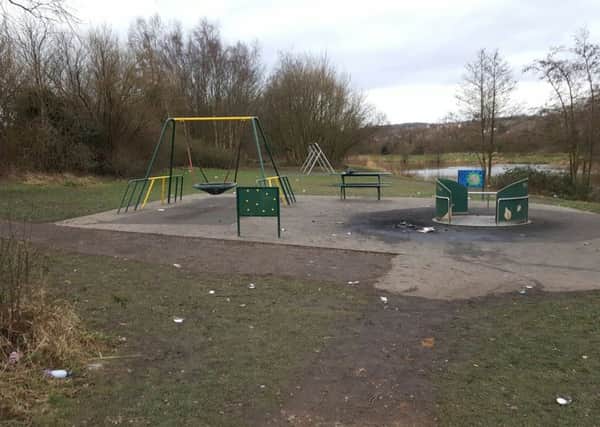 Litter strewn across the children's play area at Orrell Water Park after up to 200 teenagers congregated there