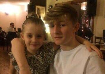 Cameron Chadwick with his six-year-old sister Brodie