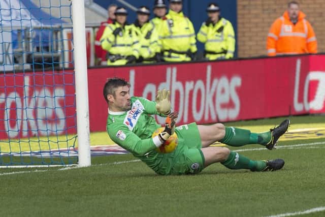 Matt Gilks made a penalty-saving start to his time at the DW Stadium on Saturday