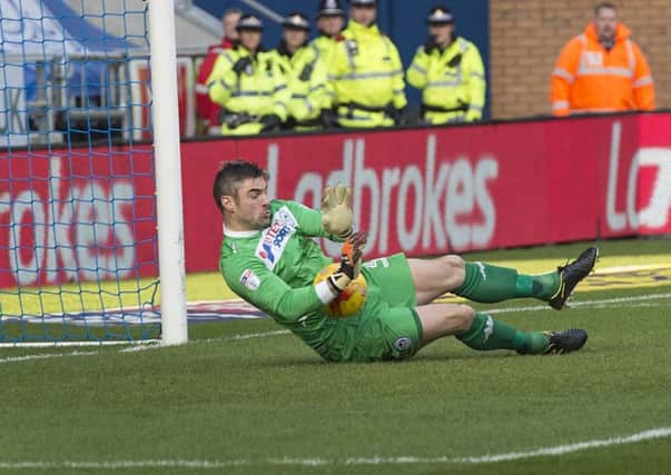 Matt Gilks made a penalty-saving start to his time at the DW Stadium on Saturday