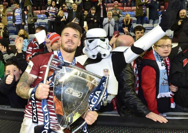 The force awakens! Oliver Gildart with a fan dressed as a Star Wars stormtrooper
