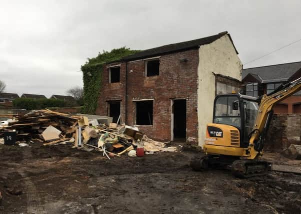 The digger before it was stolen from the site of the former Last Orders in Standish