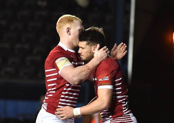 Liam Farrell congratulates Oliver Gildart on his late try