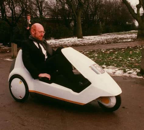 Sir Clive Sinclair in his C5 - once voted the biggest innovation disaster of all time
