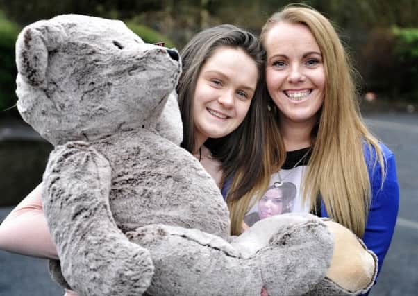 Danielle Roscoe (14) and mum Natalie Cunliffe with a tombola prize   at the fund-raiser in memory of 21-year-old Leah Cunliffe