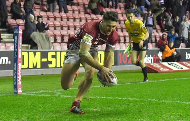 Wigan Warriors' Anthony Gelling  scores his team's third try