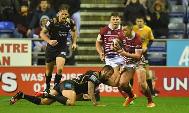 Wigan Warriors' Liam Marshall  in action on his debut
