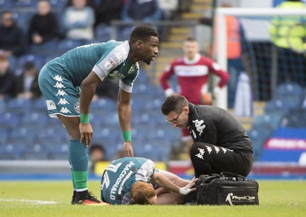 Shaun MacDonald is stretchered off at Blackburn