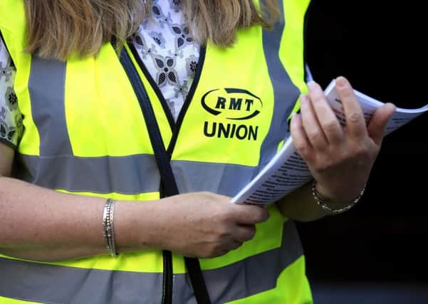 An RMT member on a picket line