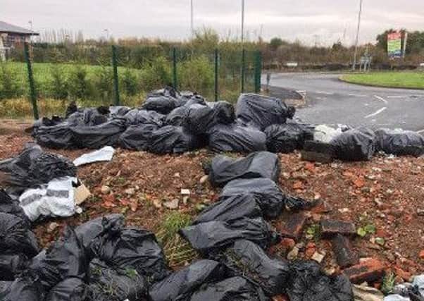 Fly-tipping outside a charity centre in Atherton