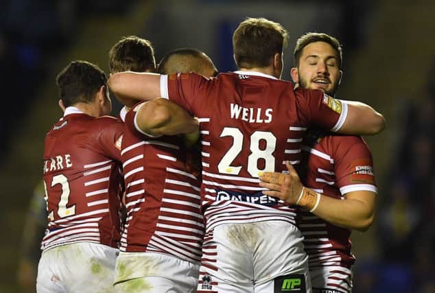 Jack Wells is congratulated after his try against Warrington