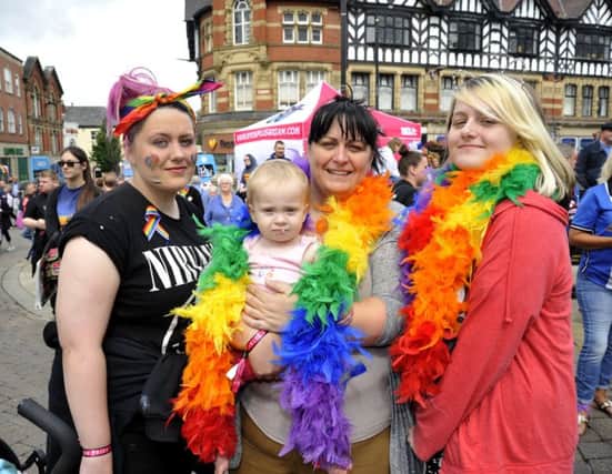 from left, Sammy Williams, Lily-Rose Williams, one, Mary Holland and Danniele Williams from Norley Hall at Wigan Pride