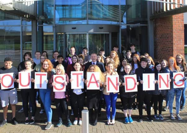 St John Rigby College students celebrate an "outstanding" Ofsted report