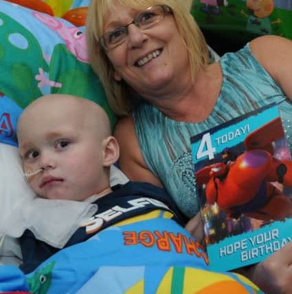 Charlie Taylor celebrates his 4th birthday in hospital, as he battles with Neuroblastoma, at Royal Manchester Children's Hospital, pictured with his Nan Veronica Marriott