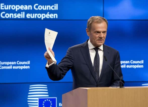 European Council President Donald Tusk with the letter from British Prime Minister Theresa May, invoking Article 50 of the blocs key treaty, the formal start of exit negotiations
