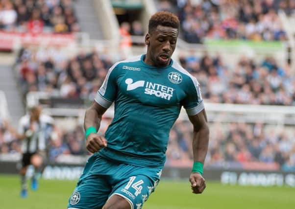 Omar Bogle in action during the 2-1 loss to Newcastle on Saturday. Inset: Graham Barrow