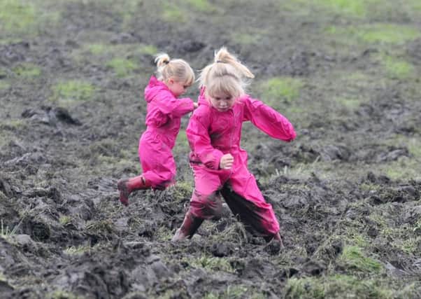 Jumping in the mud at Haigh, Aspull and Blackrod Agricultural Show held in Windmill Fields, Haigh, last year