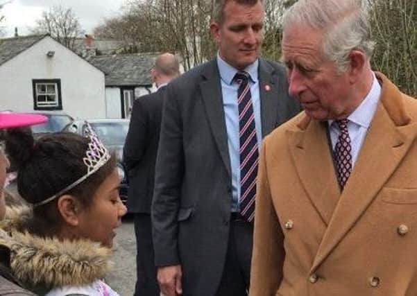 Siah Bajinka told Prince Charles about her sash when they met in Cumbria