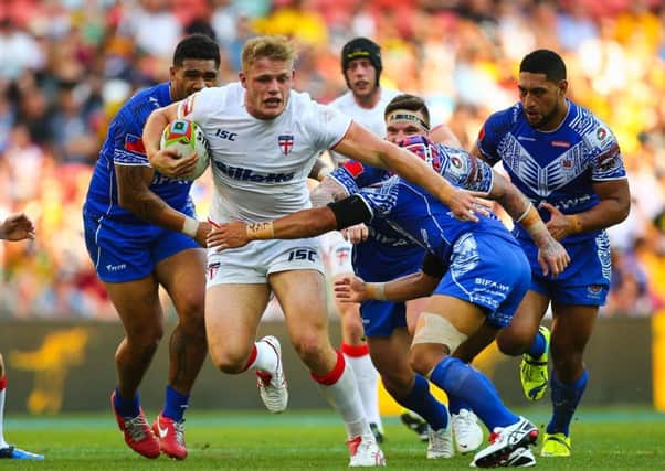 Tom Burgess takes on the Samoa defence last time England faced them in 2014 but will fans pay to stream this year's match to their devices?