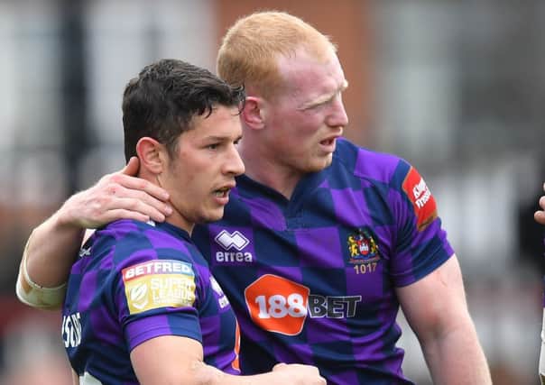 Morgan Escare and Liam Farrell during the Monday win at Wakefield