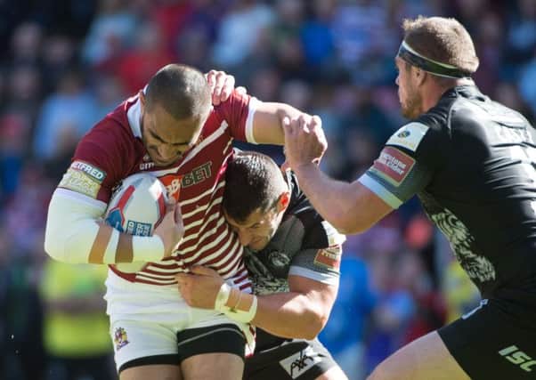 Thomas Leuluai left the action early in the second-half clutching his jaw