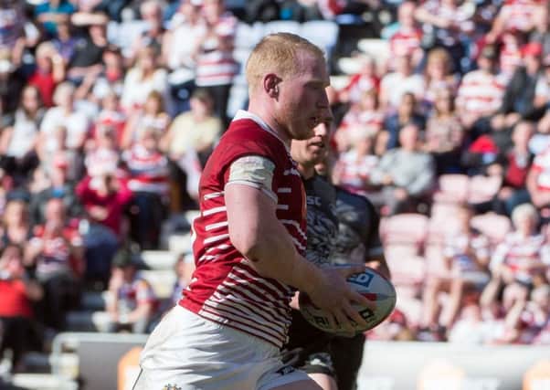 Liam Farrell scored Wigan's final try against Catalans