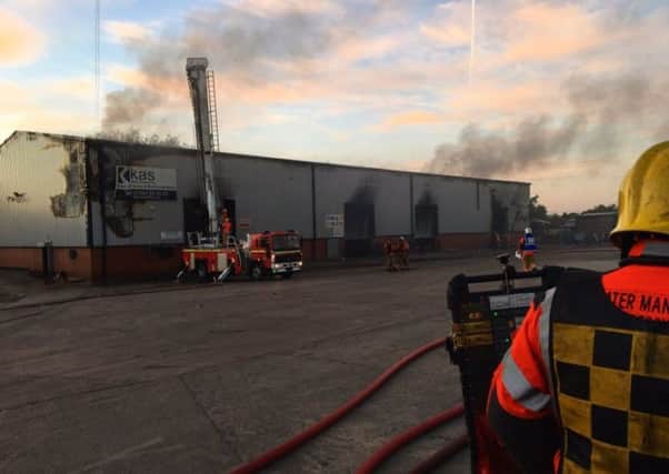 Firefighters at the scene of the blaze. Pic: Greater Manchester Fire And Rescue Service
