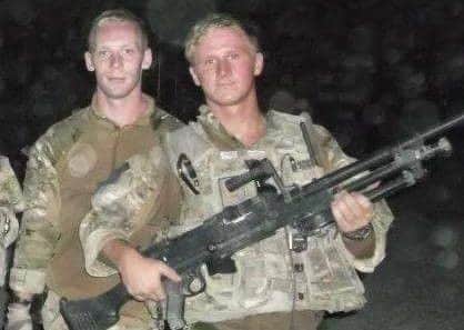 Aaron Johnson (right) during his tour of Afghanistan