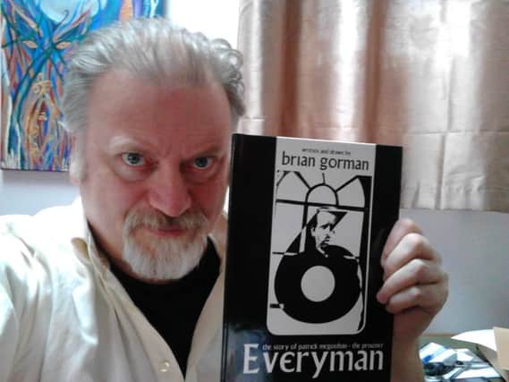 Author Brian Gorman with his graphic novel Everyman