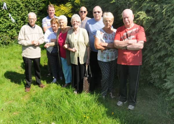 Terry Blackledge, right, with other residents of Snowden Avenue, Wigan